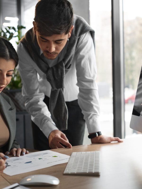 people-analyzing-checking-finance-graphs-office